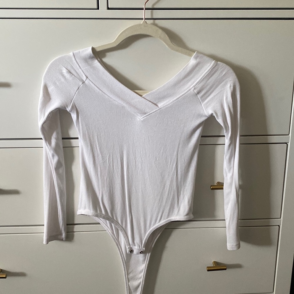 Off the shoulder, white bodysuit